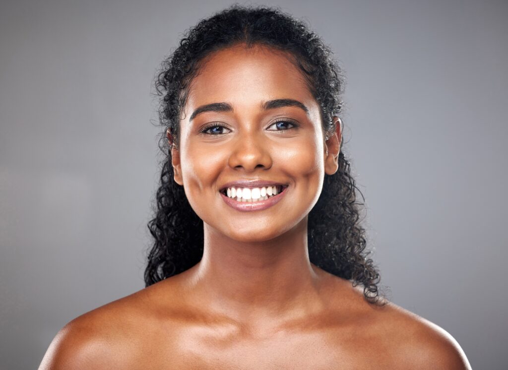 Skincare, model and beauty with black woman in studio for hygiene, grooming and pamper with mockup.